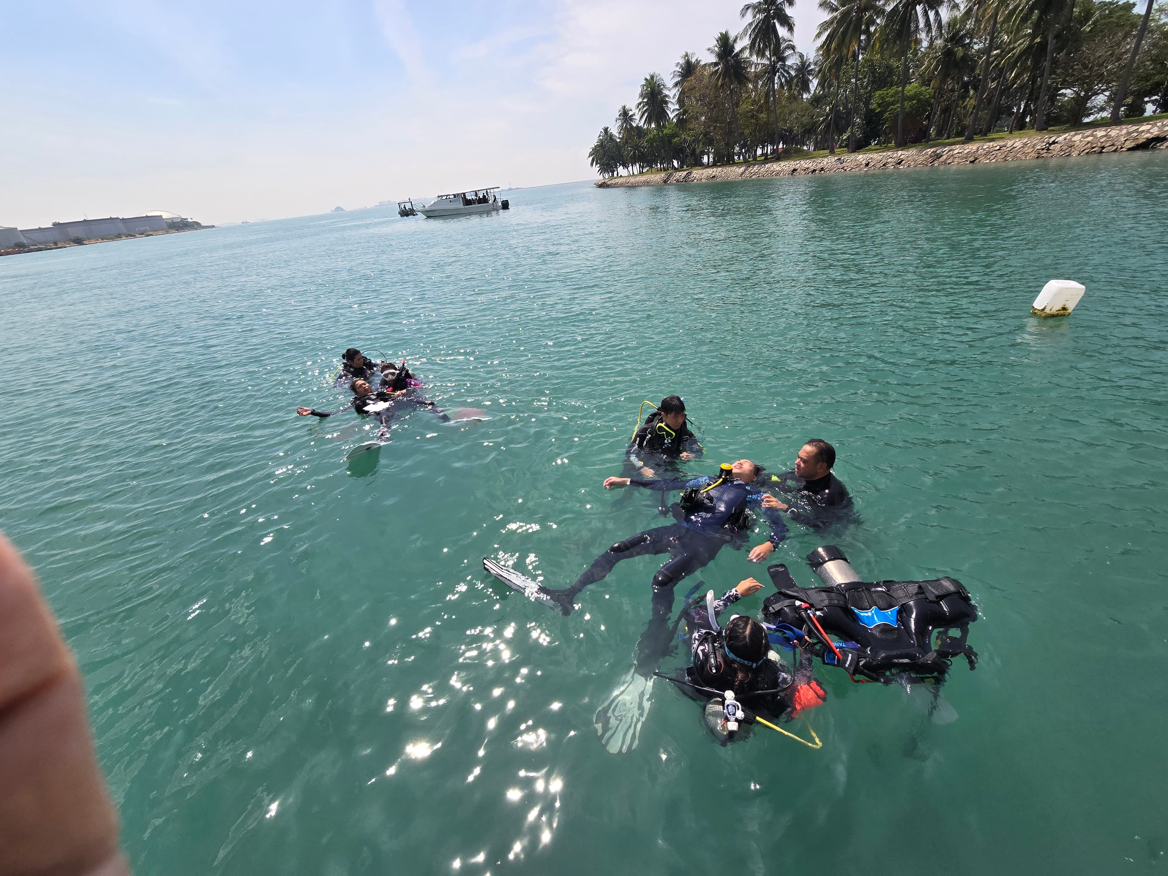 Divers in open water during IDC training